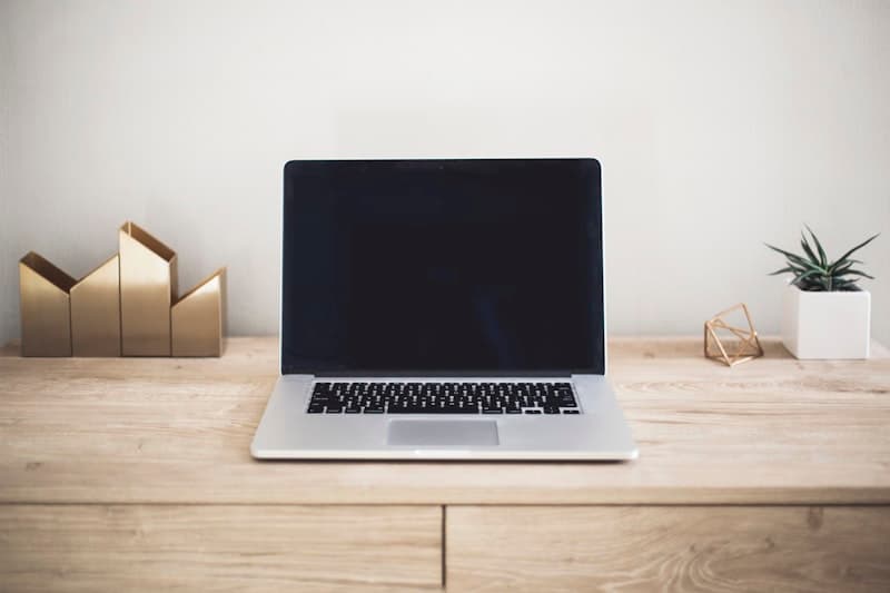Laptop with power cable plugged in
