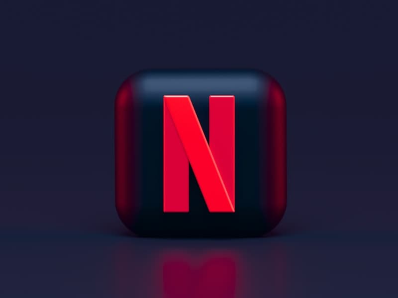 Smartphone in dark mode with colorful wallpaper