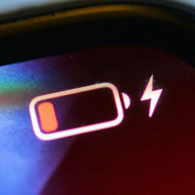 Why does my phone battery go down while charging?